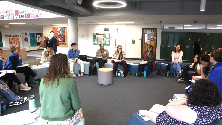 large group in open communal learning space