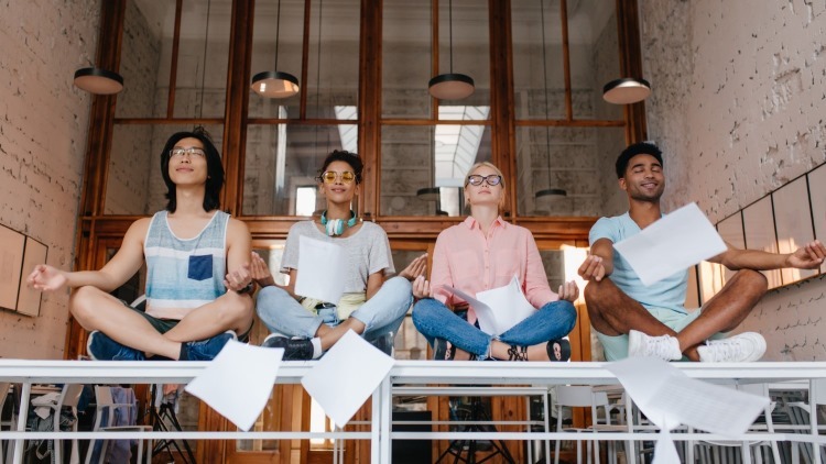 high school students meditating