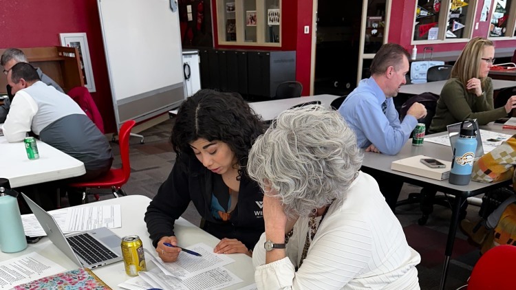coach working with teacher
