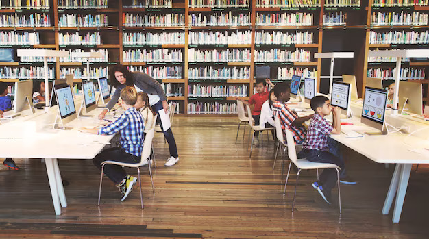 students in library media center with computers