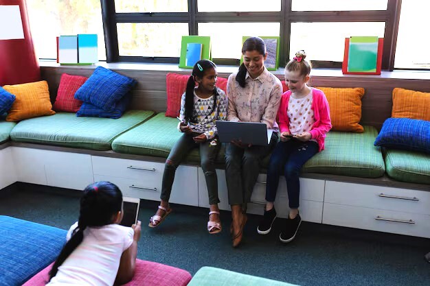 teacher with small group in flexible seating