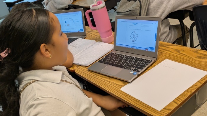 middle school student working independently in math