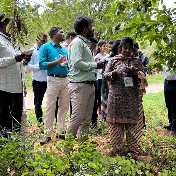 teachers taking ecology field notes