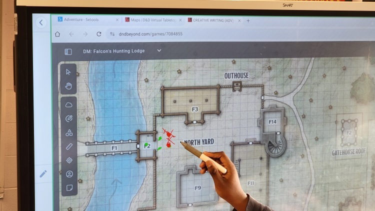 student with stylus learning with a role-playing game
