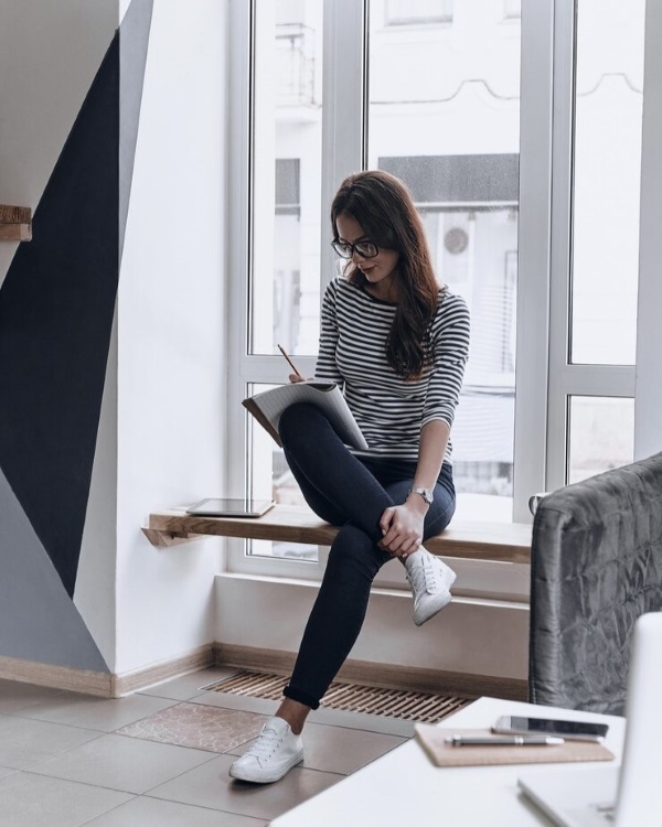working in a small well-lit nook