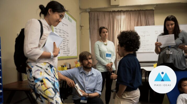 student welcomes visitors to classroom