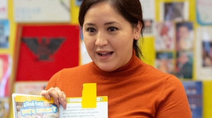 elementary teacher with nonfiction book