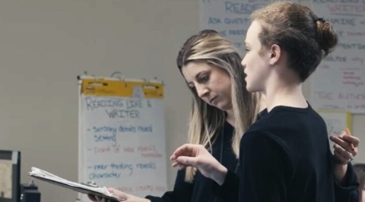 student explaining learning to teacher