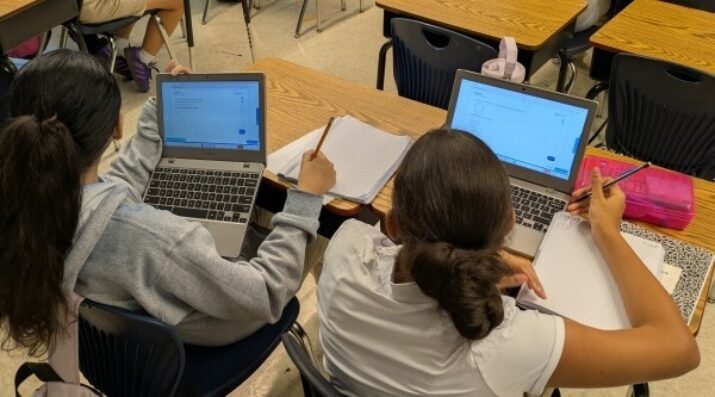 students with laptops math