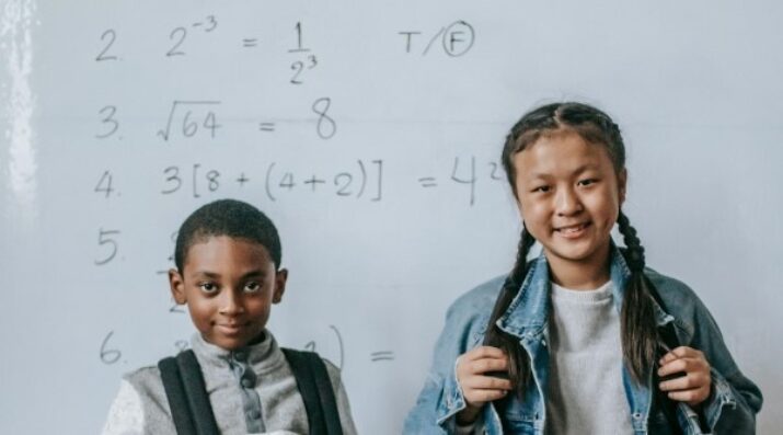 middle schoolers with math whiteboard