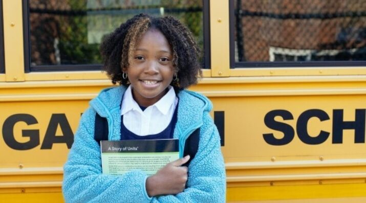 student outside a school bus