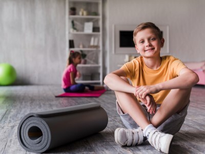 wellness middle schooler with yoga mat