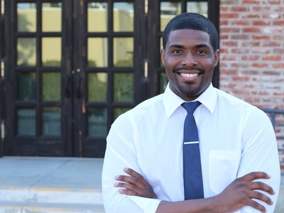 teacher at school entrance