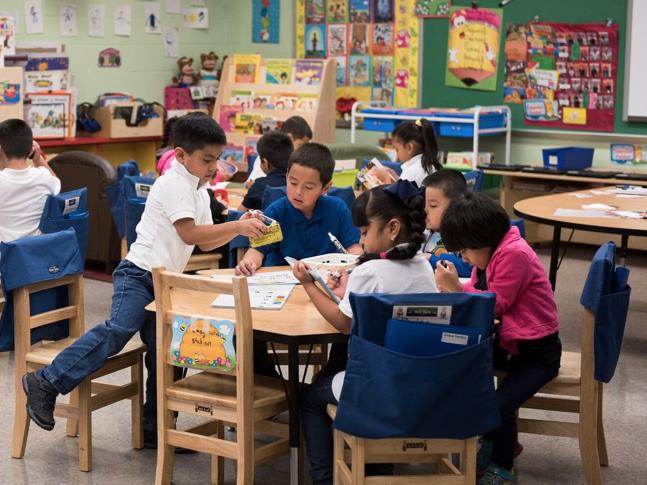 Classroom scene of small group collaboration