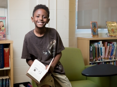middle schooler with book