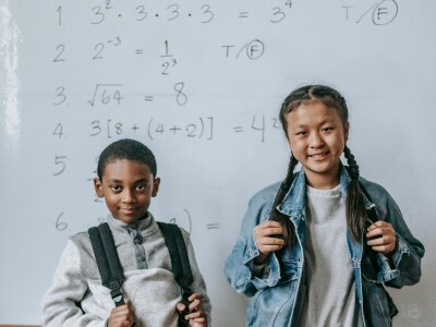 middle schoolers with math whiteboard